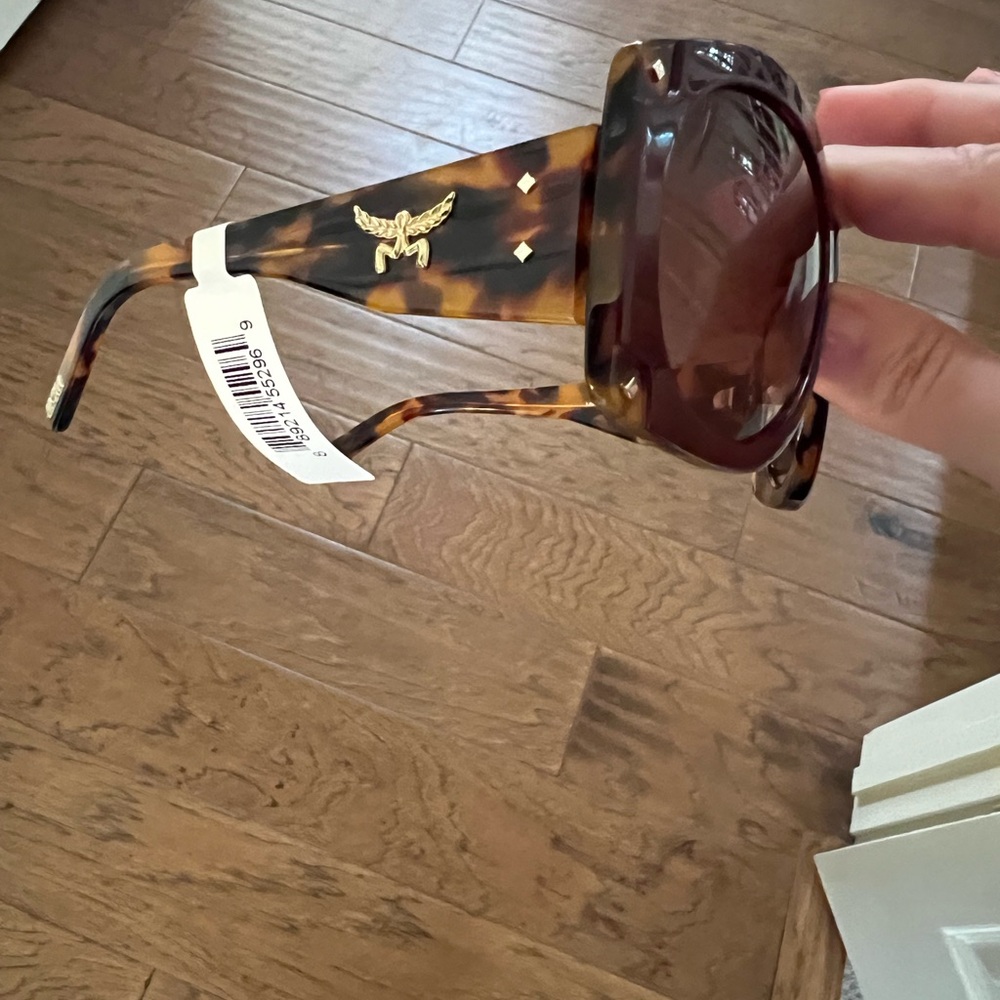 MCM Tortoise Shell Sunglasses with Gold Accent tag on